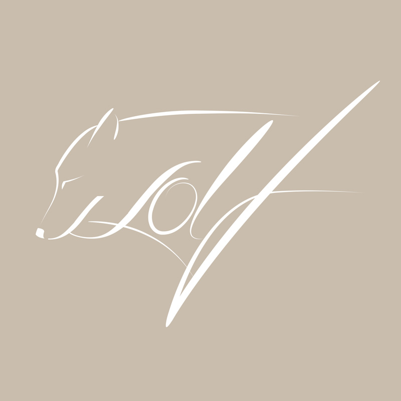 Design du logo WOLF en version blanche sur fond de couleur naturelle